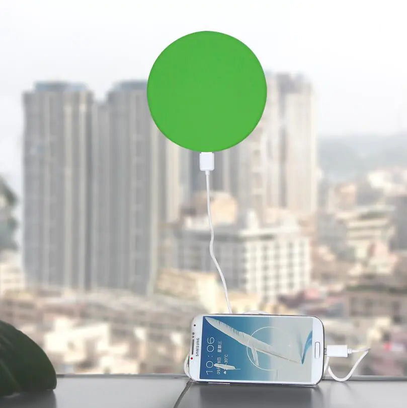 Solar-Powered Mobile Charger with Suction Cup Mount