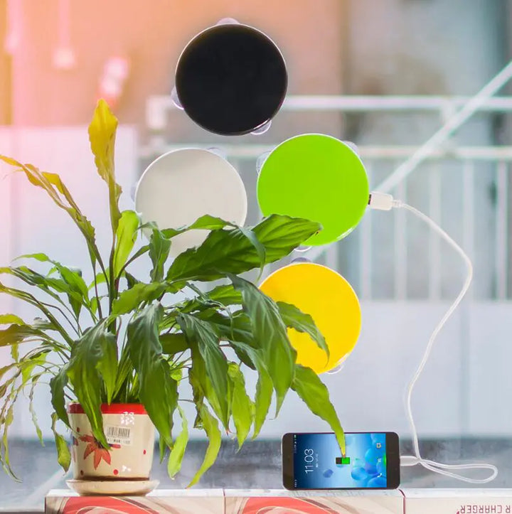 Solar-Powered Mobile Charger with Suction Cup Mount