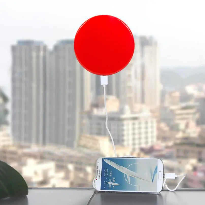 Solar-Powered Mobile Charger with Suction Cup Mount